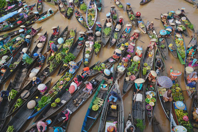 High angle view of floating market in canal