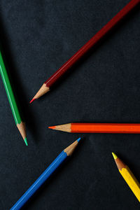 High angle view of colored pencils on table