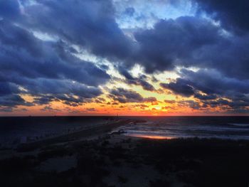 Scenic view of sea at sunset