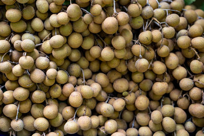 Full frame shot of longan for sale at market stall