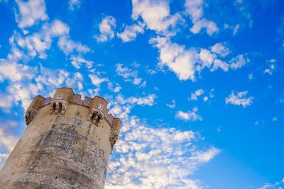 Low angle view of old ruins against sky