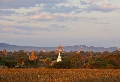 View of temple against cloudy sky