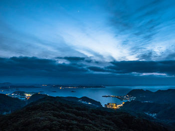 Scenic view of sea against sky at night