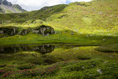 Scenic view of lake against mountain