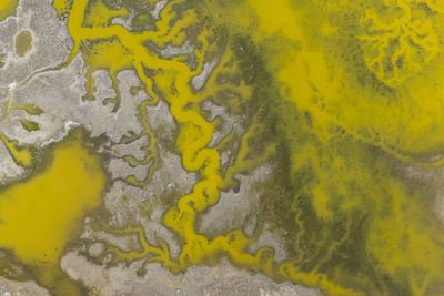 Full frame shot of yellow water flowing