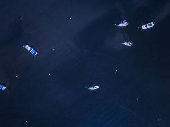 High angle view of helicopter in sea against sky