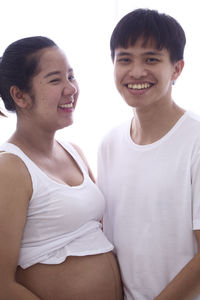 Portrait of a smiling young couple
