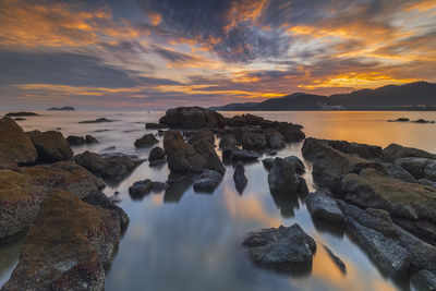 Scenic view of sea against sky during sunset