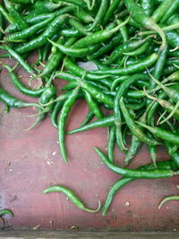 High angle view of chili peppers for sale at market