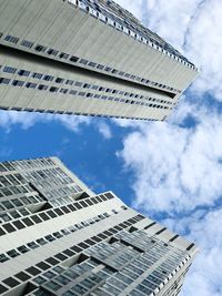 Low angle view of office building against sky