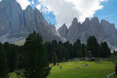 Panoramic view of trees and mountains against sky