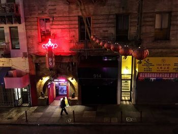 View of illuminated street at night