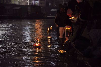 Reflection of people in water