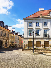 Buildings in city against sky