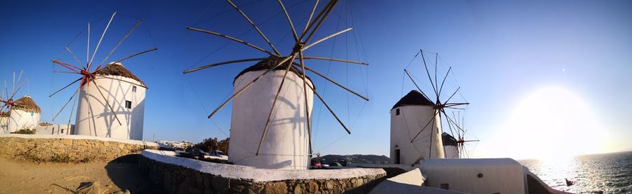 Traditional windmill against sky