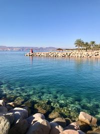 Scenic view of sea against clear sky