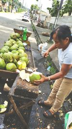 Man working on fruit