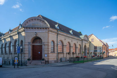 Buildings in city against sky