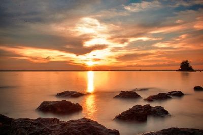 Scenic view of sunset over sea