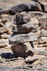 Close-up of stone stack on rock