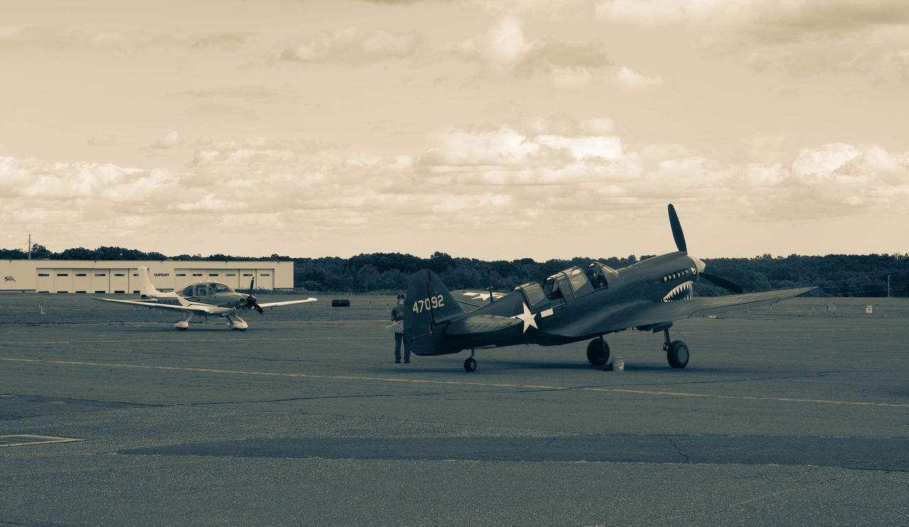 VIEW OF AIRPORT RUNWAY AGAINST SKY