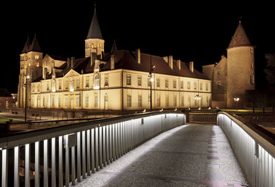Illuminated buildings in city at night