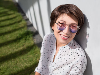 Young woman wearing sunglasses