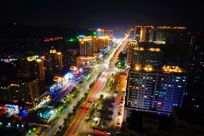 High angle view of illuminated cityscape at night