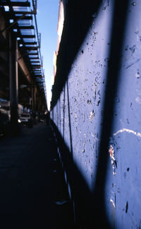 Close-up of car window against sky