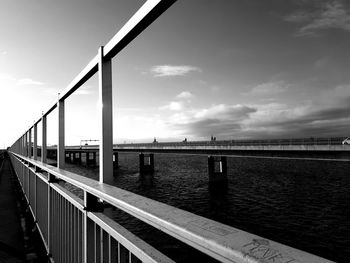 Bridge over river against sky