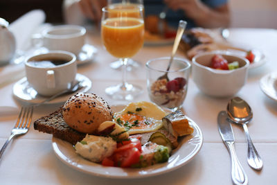 Close-up of breakfast served on table