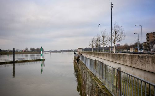 Panoramic view of bridge in city against sky