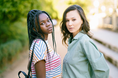 Portrait of women standing outdoors