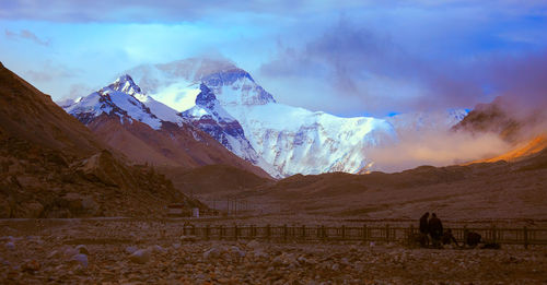 View of mountain range against cloudy sky