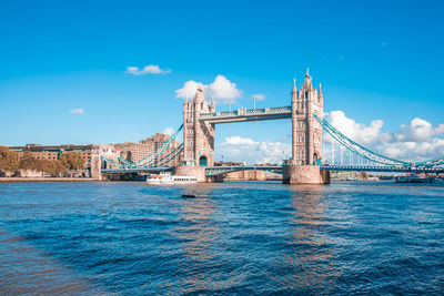 Iconic tower bridge view connecting london with southwark over thames river, uk.