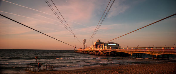 Scenic view of sea against sky at sunset