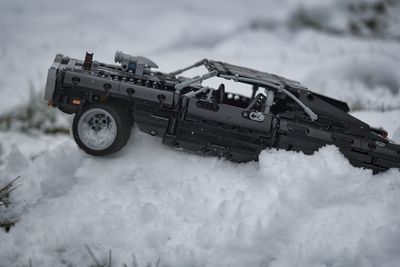 Car on snow covered land