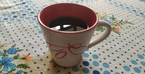 High angle view of coffee cup on table