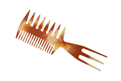 High angle view of fork over white background