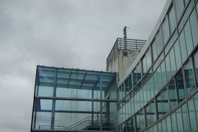 Low angle view of modern building against sky