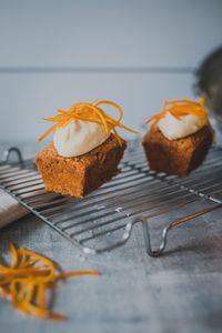 Close-up of cupcakes on cooling rack