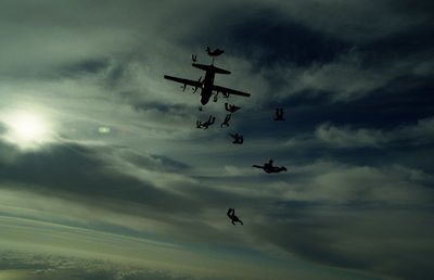 Low angle view of airplane flying in sky