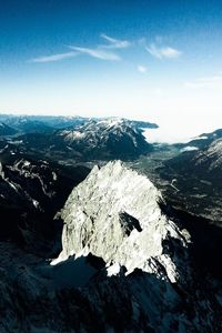 Scenic view of snowcapped mountain against sky