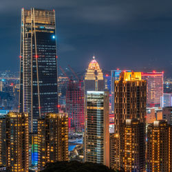 Illuminated buildings in city at night