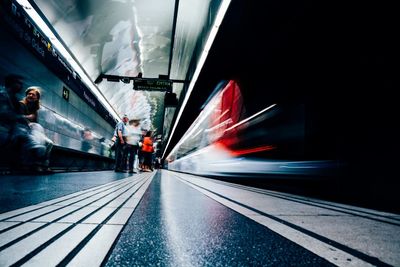 Blurred image of train moving at subway station