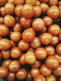 Full frame shot of oranges at market stall