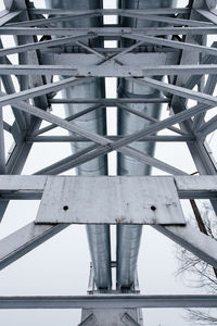 Low angle view of metallic bridge