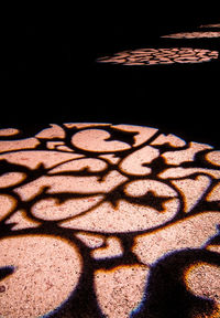 Shadow on tiled floor