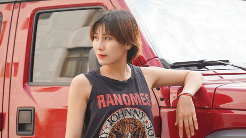 Portrait of woman looking away in car