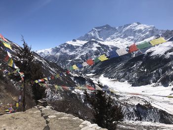 Scenic view of snowcapped mountains against sky